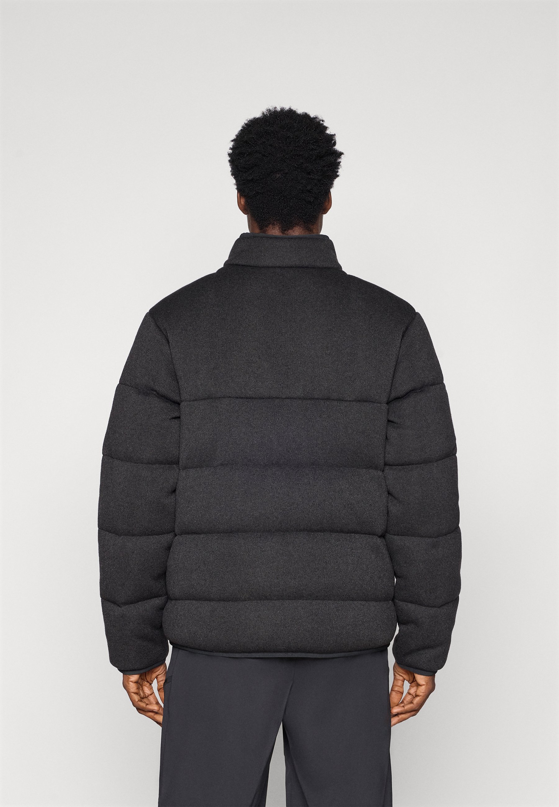 Patagonia REVERSIBLE BETTER SWEATER - Down jacket - black - Zalando