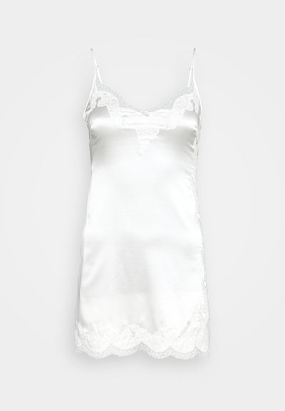 White satin camisole with adjustable spaghetti straps, featuring a lace trim along the neckline and scalloped hem for added detail.