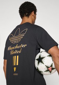 adidas Originals MANCHESTER UNITED ICON - Klub merchandise - black