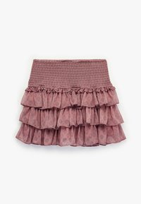 Jupe mini à niveaux dans une couleur rose poussiéreux, avec un smock élastique à la taille et un tissu à motifs avec des volants à l'ourlet.