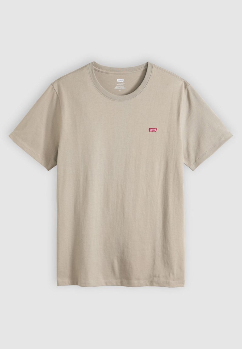 Beige bomullst-shirt med korta ärmar, rund halsringning och liten röd Levi's-logotyp på vänster bröst. Mjuk textur, avslappnad design.