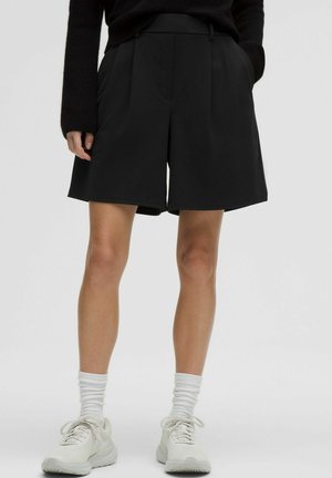 DAYDRIFT PLEATED HIGH-RISE 18CM - Pantalón corto de deporte - black