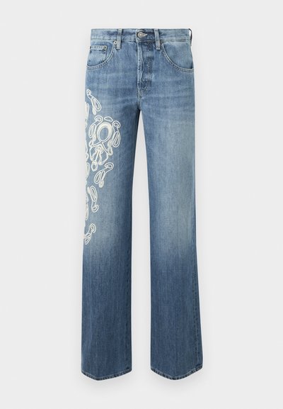 Light blue denim jeans with a relaxed fit, featuring white embroidered swirls on the left leg. Straight leg and classic five-pocket design.