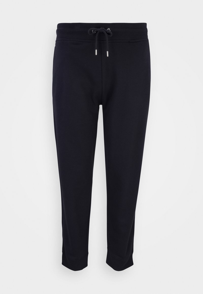 Sorte sweatpants lavet af blød stof med elastisk talje og snor. Stramme manchetter i bunden, ingen synlige mønstre eller designs.