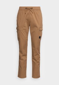 Cargo kalhoty z beige bavlněné látky, s elastickým pasem na šňůrku, bočními kapsami a kapsou na nohavici.