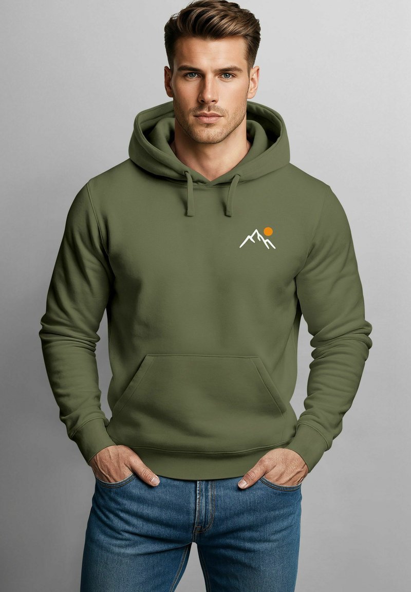 Olive green hoodie made of soft fabric with a kangaroo pocket, featuring mountain and sun graphic in white and orange. Adjustable drawstring.