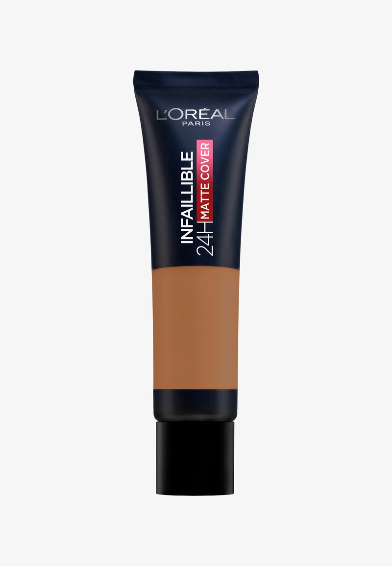 L'Oréal Paris Infallible 24H Matte Cover foundation tube with black cap and brown shade visible on lower half.