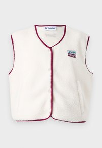 Cream fleece vest with maroon trim, V-neck design, snap closures, and an embroidered logo patch. Soft texture, sleeveless style.