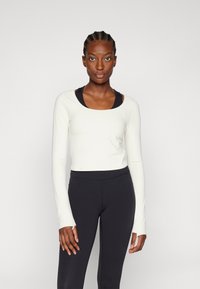 Athleta TRANSCEND TOP - Ilgarankovis viršutinės dalies drabužis - pelican cream