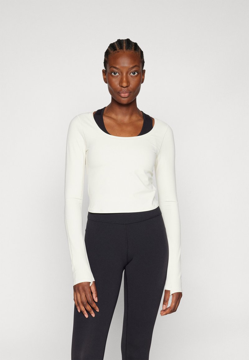 Athleta TRANSCEND TOP - Ilgarankovis viršutinės dalies drabužis - pelican cream
