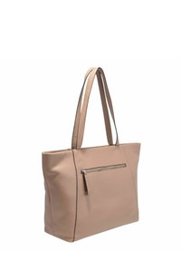 Beige leren tote bag met een gladde textuur, twee lange handvatten en een voorzak met ritssluiting. Heeft een gestructureerde vorm en een minimalistisch ontwerp.
