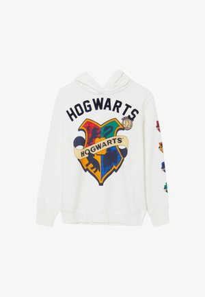 Felpa bianca con un design colorato del creatore di "Hogwarts" e vari emblemi delle case sulle maniche, con una classica tasca a canguro anteriore.