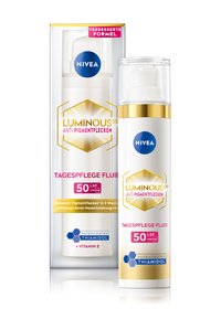 NIVEA Luminous 630 anti-pigment fluid in a white and gold bottle with a pump; includes SPF 50. Box features blue logo and German text.
