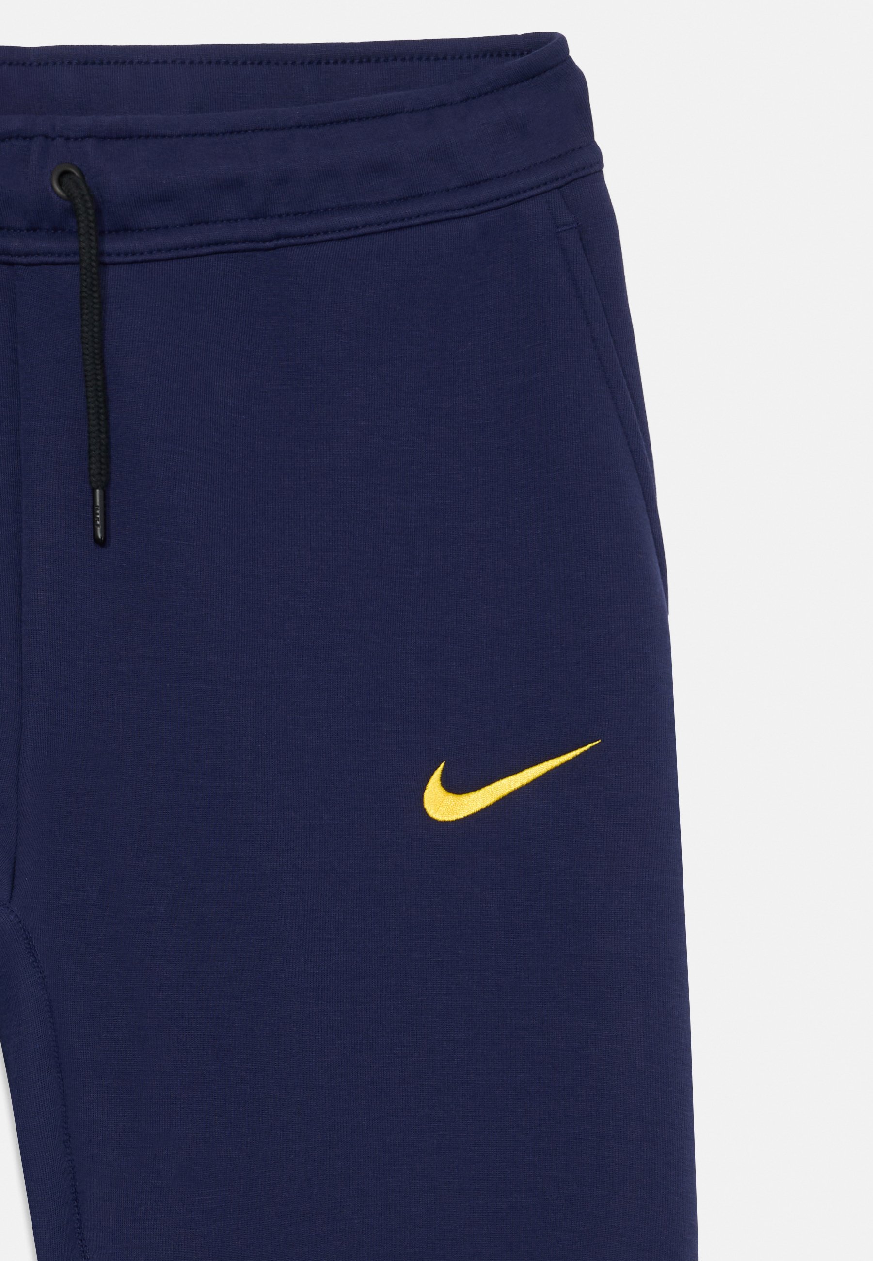 navy blue and yellow nike sweatsuit