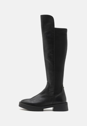 Knöchelhohe schwarze Lederstiefel mit Blockabsatz, runder Spitze und geteilter Schaftgestaltung für zusätzlichen Stil und Flexibilität.