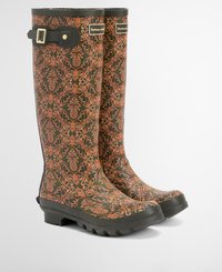 Green rubber rain boots with an orange floral pattern, a buckle accent on the side, and a textured sole for traction.