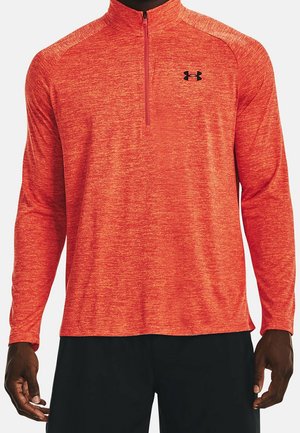 Herre langærmet rød meleret atletisk trøje med kvart lynlås og sort Under Armour-logo på brystet.
