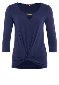 Mörkblå långärmad topp med rundad halsringning och guldaccent i mitten. Har en vriden knutdetalj vid midjan. Slät tyg.
