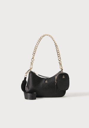 Black leather handbag with gold chain strap, smooth texture, curved shape, zipper closure, and a small attached pocket.