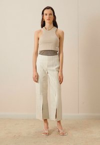 By Malene Birger WARRAN - Leather trousers - cream snow