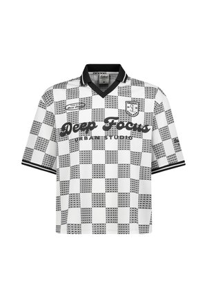 Short-sleeve black-and-white checkered polo shirt with pattern, black collar, and "Deep Focus" text across the chest.