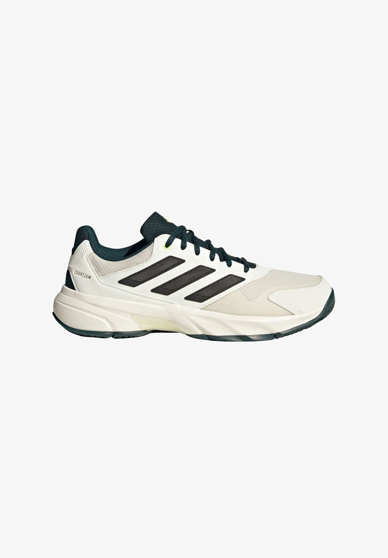 White athletic shoe with dark green accents, featuring a mesh upper, black synthetic stripes, and a textured rubber sole.