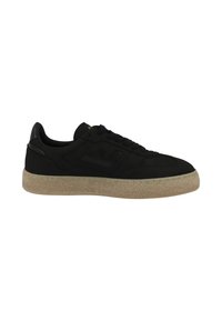 Black sneakers with a textured leather upper, rubber sole, and a rounded toe. Features subtle logo accents and tonal stitching.