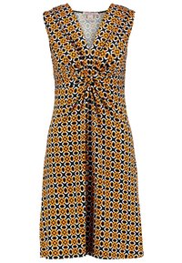 Vestido sin mangas con estampado floral y detalle de nudo en la cintura, que presenta colores naranja, negro y blanco en un diseño geométrico.