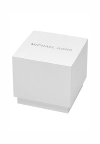 White square box with textured surface and a silver embossed "MICHAEL KORS" logo on the top. Closure is a flap design with no visible hardware.
