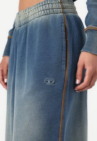 Diesel ZENIA - Spodnji deli trenirk - blue denim