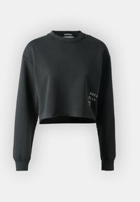 Felpa nera corta con maniche lunghe, scollo rotondo e orlo grezzo. Presenta testo stampato sulla parte anteriore. Realizzata in materiale morbido.