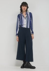 Calliope Camicia - une variante