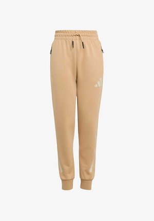 Pantaloni jogger beige con una vita regolabile con cordino, tasche laterali e un logo riflettente sulla coscia sinistra. Materiale morbido con polsini affusolati.