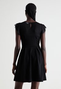 VILA Koktejlové šaty / šaty na párty - black