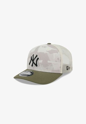 Baseball cap in light camo pattern with a solid olive green visor. Features an embroidered black logo and mesh back panel for ventilation.
