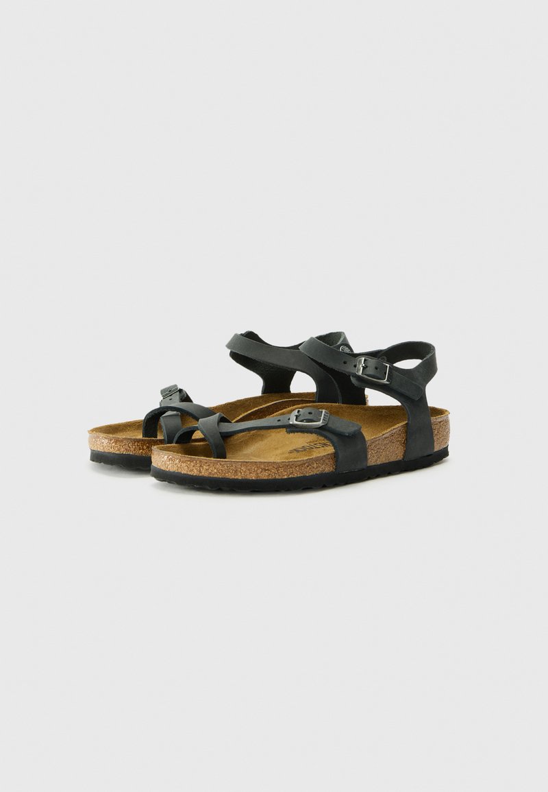 Schwarze Korksohlen-Sandalen mit verstellbaren Riemen, die ein glattes Obermaterial, Schnallenakzente und ein konturiertes Fußbett für zusätzlichen Komfort bieten.
