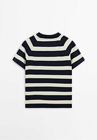 Chemise en maille à manches courtes avec rayures horizontales noires et blanches, col rond, présentée à plat sur fond blanc.