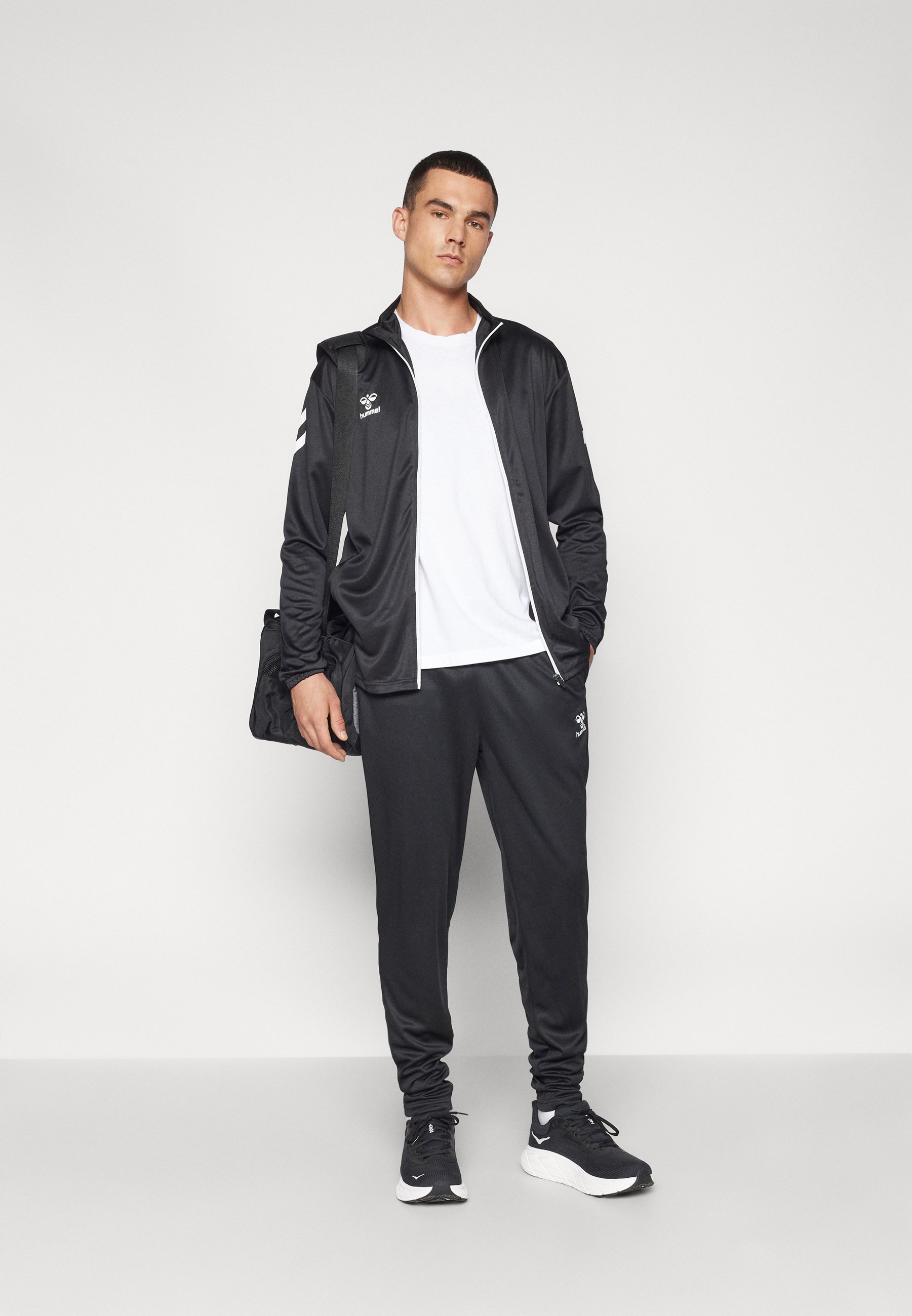 ウォーキング・ランニングウェア archive hummel set-up track jacket pants hummel TRACKSUIT JACKET SPORTSWEAR - BLACK | hummel.net