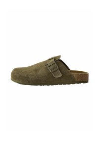 Olive green suede slip-on shoe with a metal buckle detail, rounded toe, textured upper, and a brown cork footbed. Flat rubber sole.