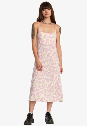 Floral midi dress in pastel pink and yellow, featuring thin straps and a relaxed fit. Made of soft fabric with a subtle texture.