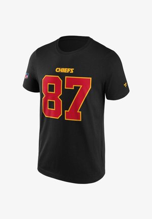 Czarna koszulka z krótkim rękawem z bawełny z wyraźnym czerwonym napisem "87" oraz żółtym napisem "CHIEFS". Logo NFL na lewym rękawie. Prosty design.