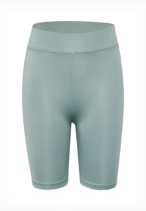 Jasnozielone szorty rowerowe z wysokim stanem, gładką fakturą i widocznym przeszyciem na białym tle.