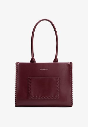Sac fourre-tout en cuir bordeaux foncé avec double poignées, poche avant visible avec surpiqûres décoratives et logo "WITTCHEN" centré au-dessus de la poche.