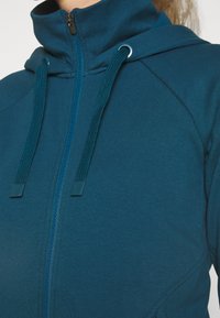 Athleta TRIUMPH HOODIE - Camisola com fecho - dark sardinia blue