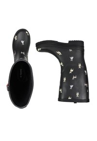 Black rubber rain boots featuring colorful dog patterns. The design includes a textured grip sole and an inner lining for comfort.