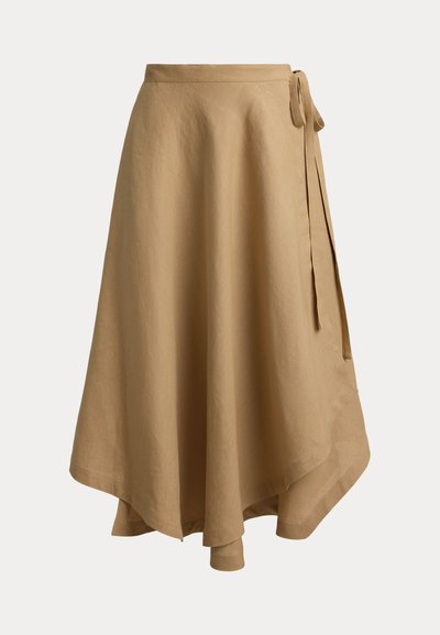 Smėlio spalvos sijonas su užrišamuoju uždengimu, asimetrišku kraštu ir raišteliu dešinėje pusėje, pagamintas iš lengvos medžiagos.