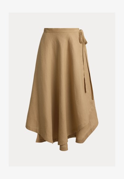 Smėlio spalvos sijonas su užrišamuoju uždengimu, asimetrišku kraštu ir raišteliu dešinėje pusėje, pagamintas iš lengvos medžiagos.