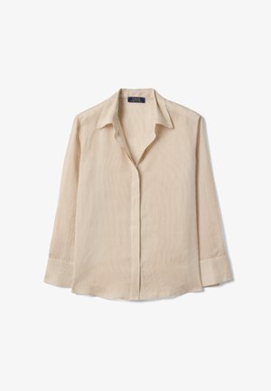 Blusa beige a maniche lunghe con sottili righe verticali, polsini larghi e collo appuntito, mostrata distesa su uno sfondo bianco.