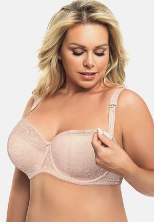 Nude-Spitzen-BH mit Unterleibriemen, Blumenmuster, verstellbaren Trägern und einem Verschluss vorne. Verfügt über eine kleine Schleifenakzent in der Mitte.