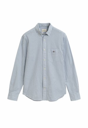 Camisa de botón de manga larga con un patrón a cuadros en azul y blanco y un único bolsillo en el pecho sobre un fondo liso.